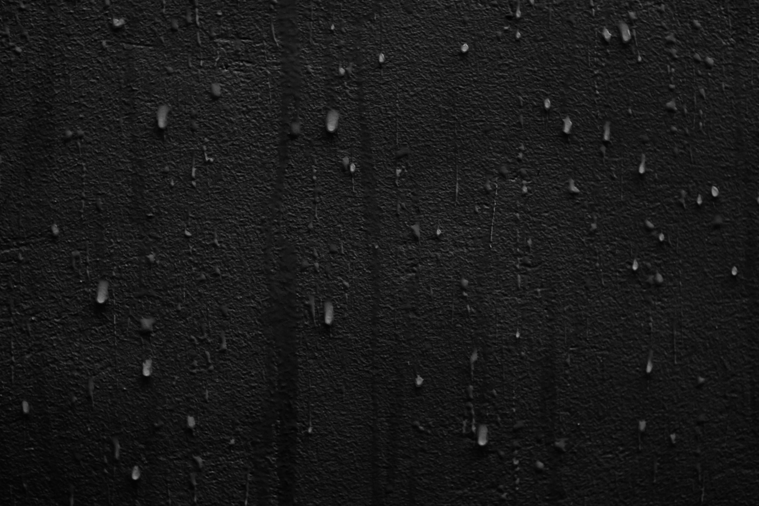 Gouttes pluie mur fissure sombre texture